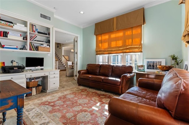 living room featuring crown molding