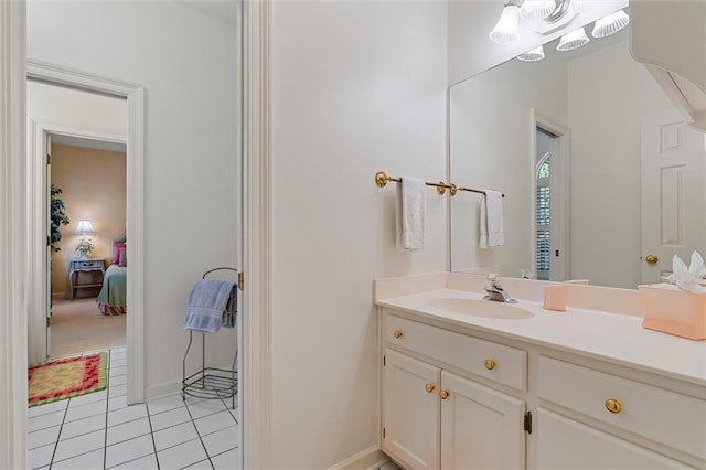 bathroom with tile patterned flooring and vanity