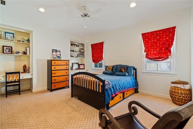 carpeted bedroom featuring ceiling fan