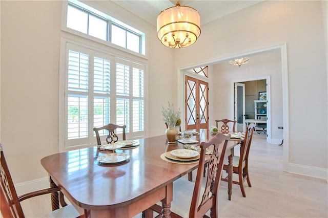 8529 Crepe Myrtle Ct, Mobile, AL 36619 - dining room with an inviting chandelier, baseboards, and light wood finished floors