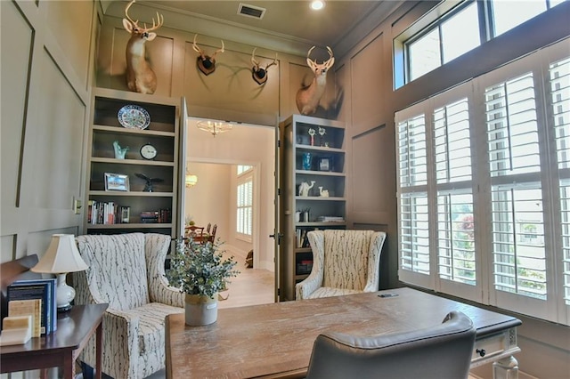 8529 Crepe Myrtle Ct, Mobile, AL 36619 - office featuring visible vents, crown molding, a notable chandelier, and a healthy amount of sunlight