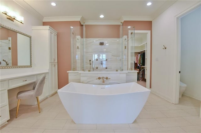 8529 Crepe Myrtle Ct, Mobile, AL 36619 - bathroom featuring crown molding, a freestanding tub, a stall shower, and a spacious closet