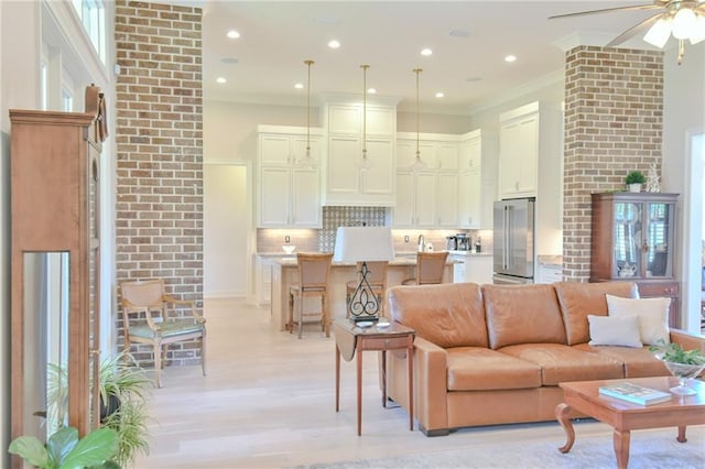 8529 Crepe Myrtle Ct, Mobile, AL 36619 - living room featuring crown molding, recessed lighting, ceiling fan, and light wood finished floors
