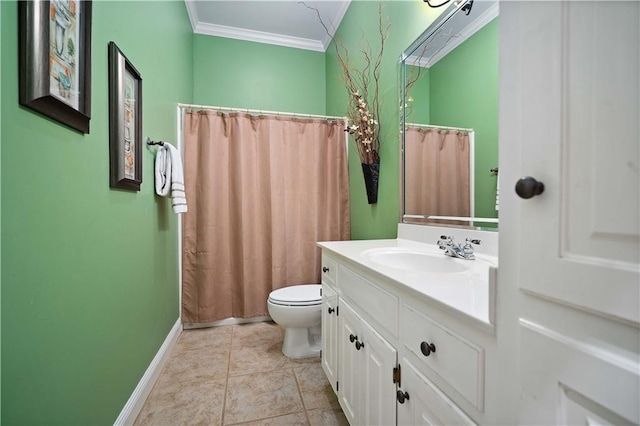 bathroom with tile patterned floors, vanity, toilet, and ornamental molding