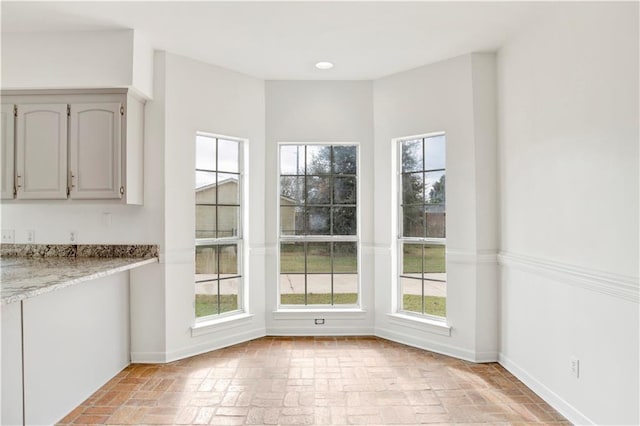 view of unfurnished dining area