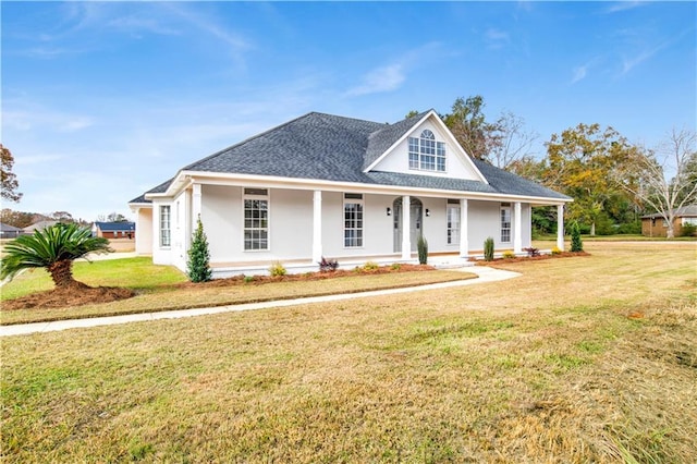 view of front facade with a porch and a front lawn