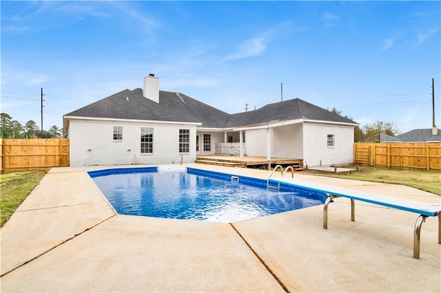 view of pool featuring a wooden deck