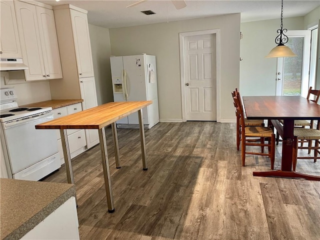 kitchen with decorative light fixtures, white cabinetry, dark hardwood / wood-style floors, ceiling fan, and white appliances