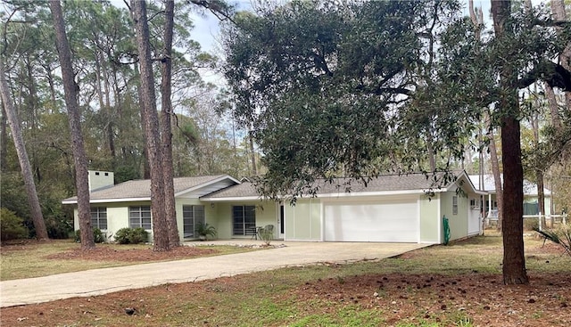 single story home with a garage