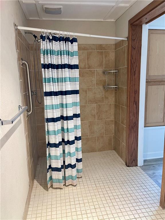 bathroom with tile flooring