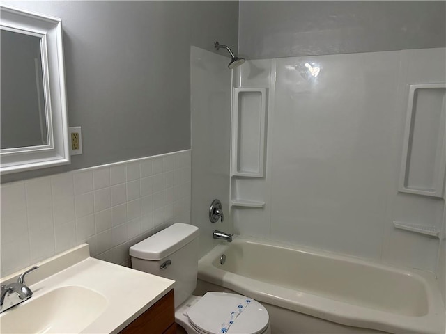 3052 Jane St, Mobile, AL 36606 - bathroom with toilet, tile walls, vanity, and  shower combination