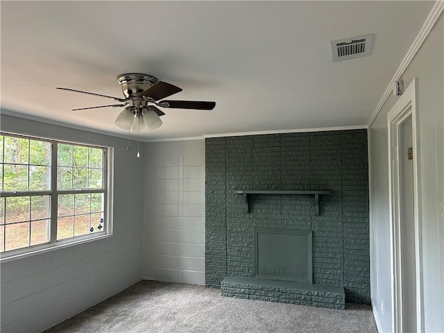3052 Jane St, Mobile, AL 36606 - unfurnished living room featuring a ceiling fan, carpet, ornamental molding, visible vents, and a fireplace