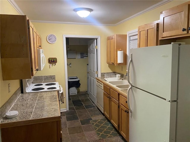 kitchen with crown molding and white appliances