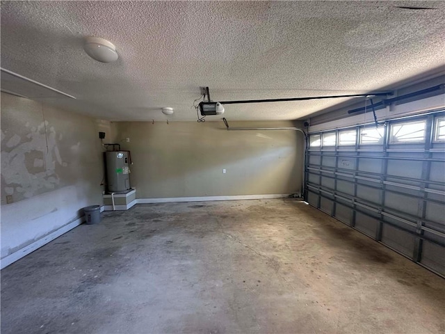 garage featuring a garage door opener and electric water heater