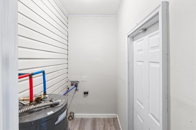 1101 Elmira St, Mobile, AL 36604 - washroom with crown molding, wood finished floors, hookup for a washing machine, and baseboards