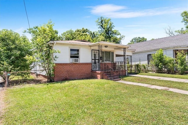 1101 Elmira St, Mobile, AL 36604 - bungalow featuring brick siding and covered porch