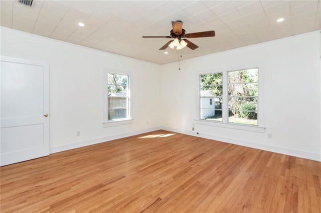 unfurnished room with wood-type flooring and ceiling fan