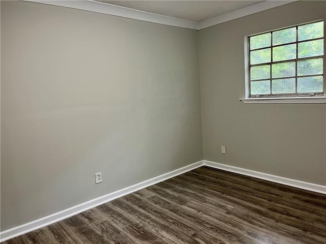 8636 Boe Rd, Irvington, AL 36544 - empty room with dark wood-type flooring and baseboards