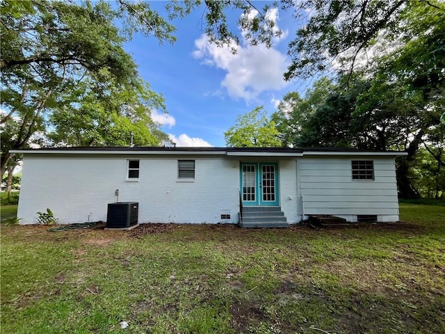 8636 Boe Rd, Irvington, AL 36544 - back of house featuring entry steps, crawl space, central AC, and a lawn