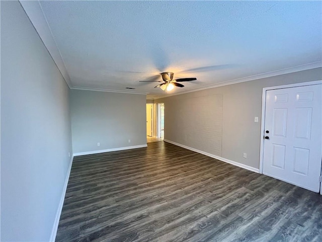 8636 Boe Rd, Irvington, AL 36544 - empty room featuring dark wood-type flooring, ceiling fan, baseboards, ornamental molding, and a textured ceiling