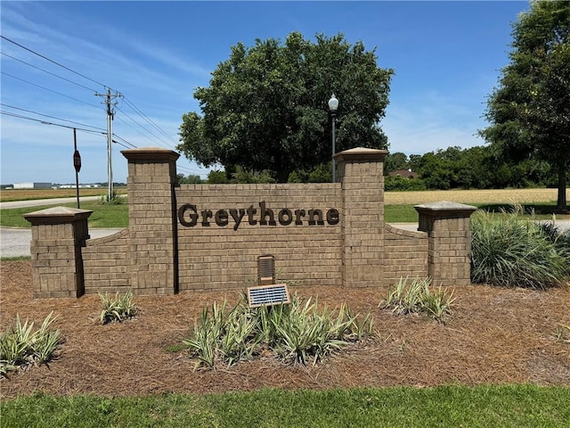 view of community sign