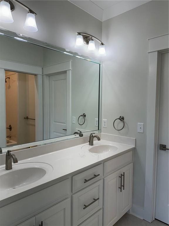 bathroom featuring double vanity