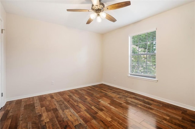 unfurnished room with dark wood-type flooring and ceiling fan