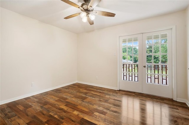 spare room with french doors, ceiling fan, and dark hardwood / wood-style floors