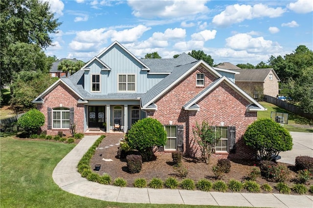 view of front of home with a front lawn