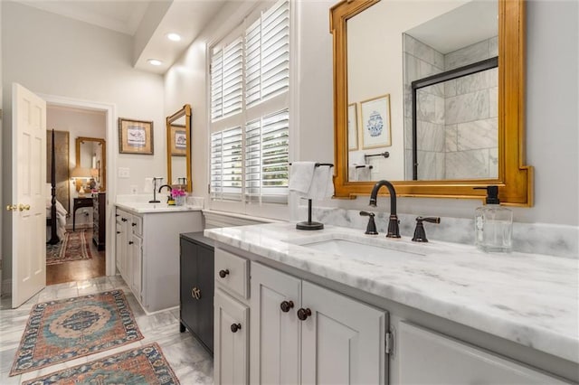 bathroom with vanity and wood-type flooring