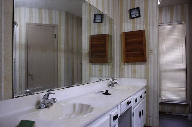 6500 Camden Cir, Mobile, AL 36618 - bathroom with wallpapered walls and double vanity
