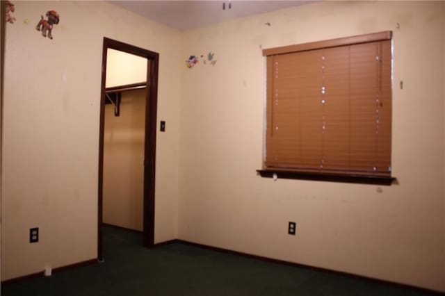 6500 Camden Cir, Mobile, AL 36618 - unfurnished bedroom featuring baseboards and dark colored carpet