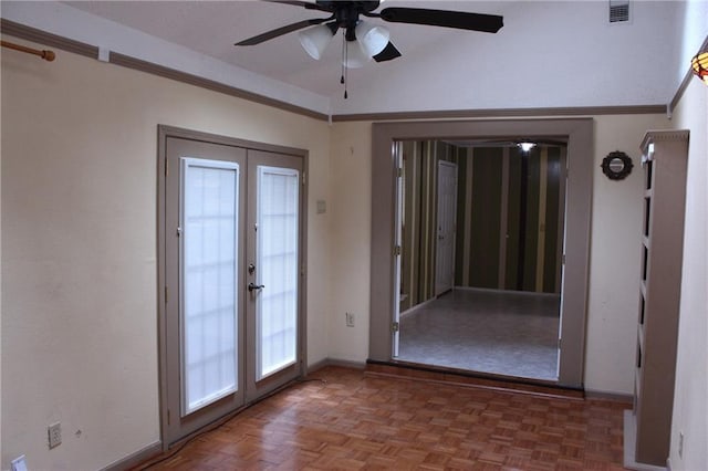 6500 Camden Cir, Mobile, AL 36618 - empty room featuring french doors, a ceiling fan, and baseboards