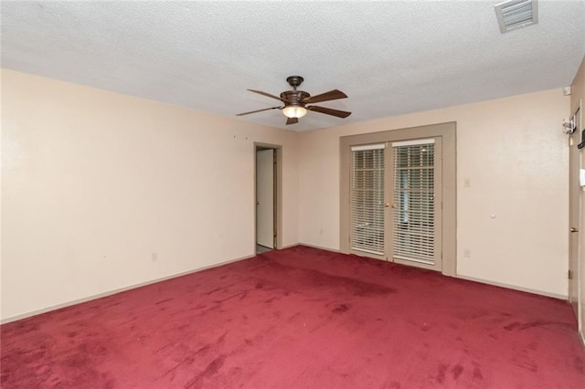 6500 Camden Cir, Mobile, AL 36618 - empty room featuring carpet floors, ceiling fan, baseboards, and a textured ceiling