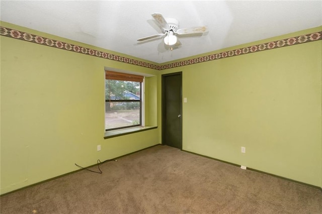 6500 Camden Cir, Mobile, AL 36618 - empty room with carpet floors, ceiling fan, and baseboards