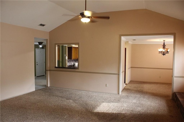 6500 Camden Cir, Mobile, AL 36618 - carpeted spare room with lofted ceiling, a ceiling fan, and a chandelier