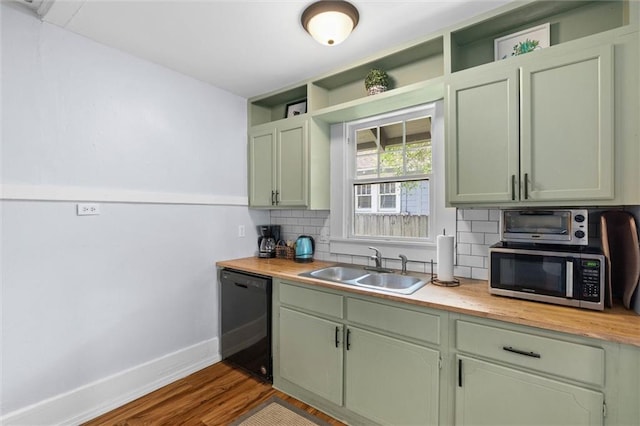 1704 Laurel St, Mobile, AL 36604 - kitchen with dishwasher, stainless steel microwave, open shelves, and green cabinets