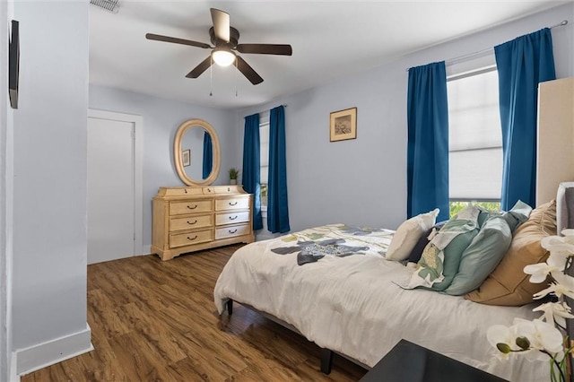 1704 Laurel St, Mobile, AL 36604 - bedroom featuring dark wood finished floors and a ceiling fan