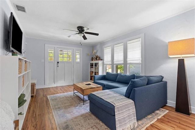 1704 Laurel St, Mobile, AL 36604 - living area featuring wood finished floors and a ceiling fan
