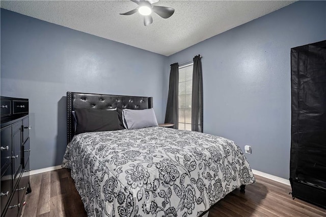 2017 Knollwood Dr, Mobile, AL 36609 - bedroom with dark wood-style floors, baseboards, a textured ceiling, and a ceiling fan