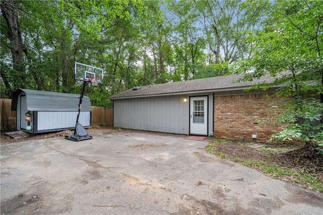 2017 Knollwood Dr, Mobile, AL 36609 - view of patio / terrace featuring fence, a shed, and an outdoor structure