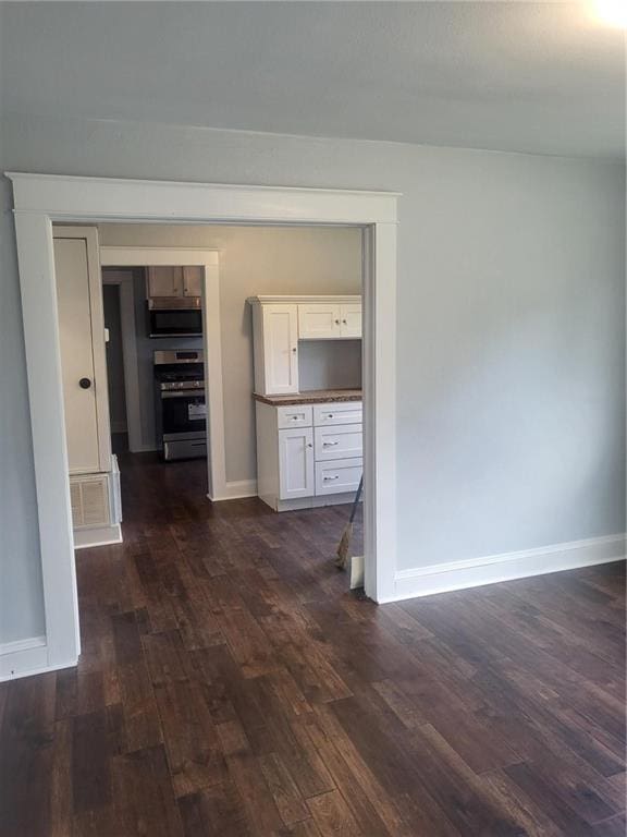 hall featuring dark hardwood / wood-style flooring