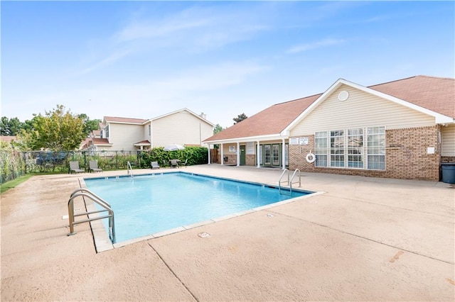 view of pool featuring a patio