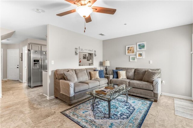 living room featuring ceiling fan