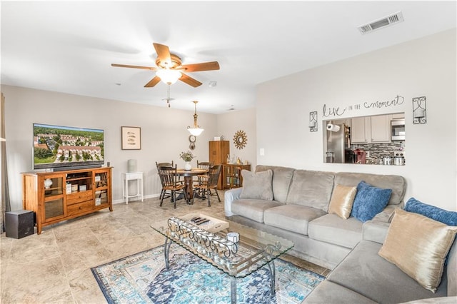 living room featuring ceiling fan