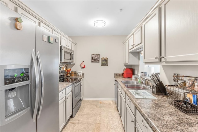 kitchen featuring stainless steel appliances and sink