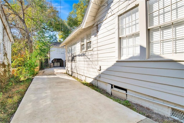 view of property exterior featuring a patio