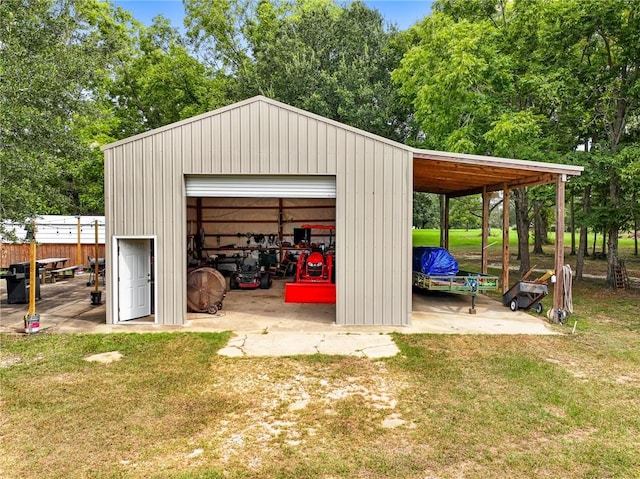 garage with a lawn