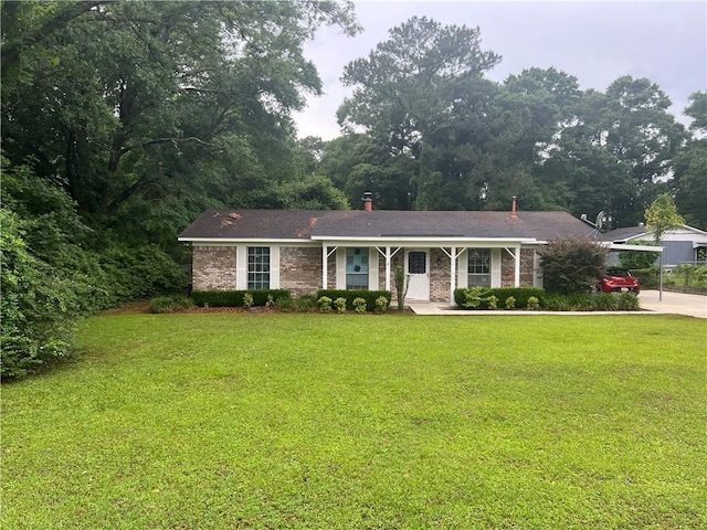 2618 Diberville Dr N, Mobile, AL 36695 - ranch-style home with a front yard and a porch