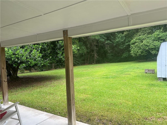 2618 Diberville Dr N, Mobile, AL 36695 - view of grassy yard featuring a patio area